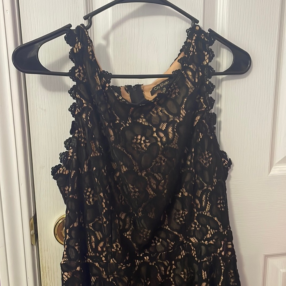 Assumed original price. Teenage dress, formal. Black floral pattern. Size 13.
